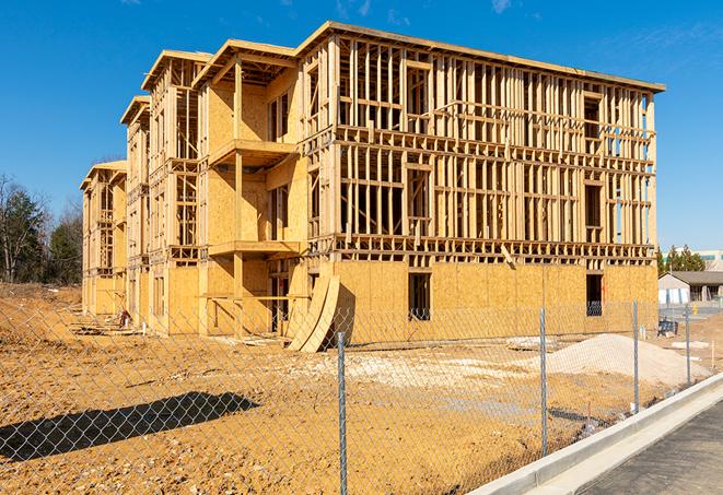 a snapshot of temporary chain link fences protecting a large construction project from unauthorized access in Gilbert, AZ